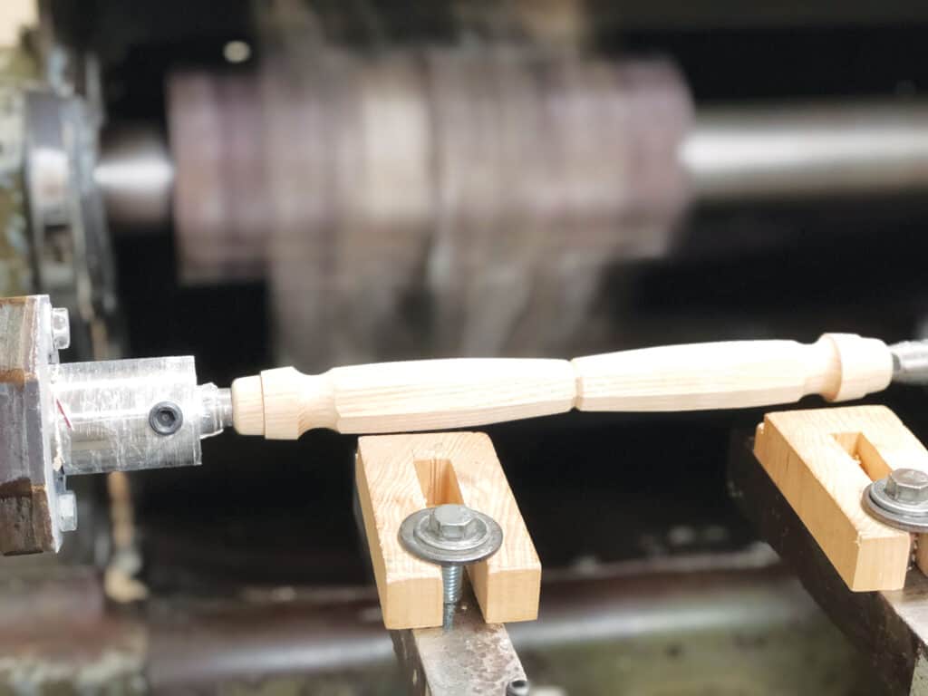 Crafted Elements’ skilled workers use a Mattison Rotary Lathe to shape items such as this handle.