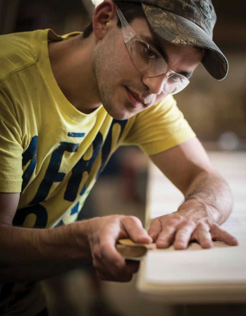 Chester Kidwell works at Gat Creek as a builder with a specialization in solving problems. In his line of work, fine sanding comes in handy.