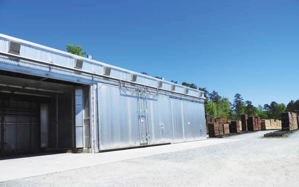 Three of Prime Lumber’s eight SII dry kilns are shown. Total drying capacity is about 480,000 board feet.