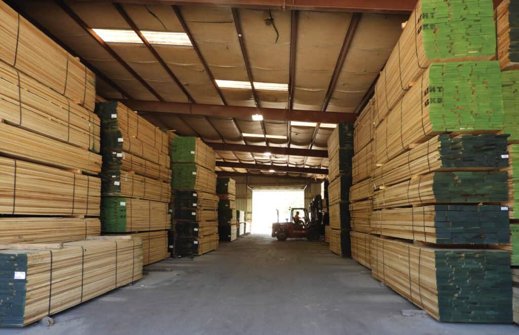 Walnut lumber is stored on the air-dry yard at Prime Lumber.