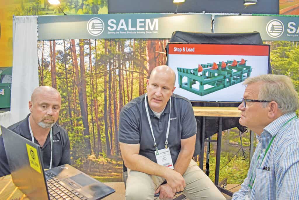 Paul Potter and Dan Zeamer, Salem Equipment Inc., Sherwood, OR; and Tommy Battle, Battle Lumber Co., Wadley, GA