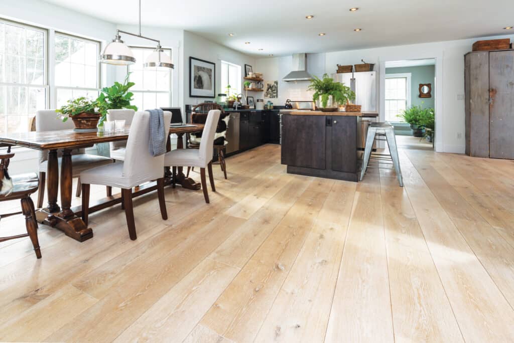 This wide-plank light character White Oak flooring includes light whitewash and finish by the customer.