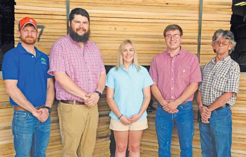 (From left) Thomas Rhodes, John Treat, Molly Moore, Seth Moore and Raymond Hamilton at R&M Wood Inc.