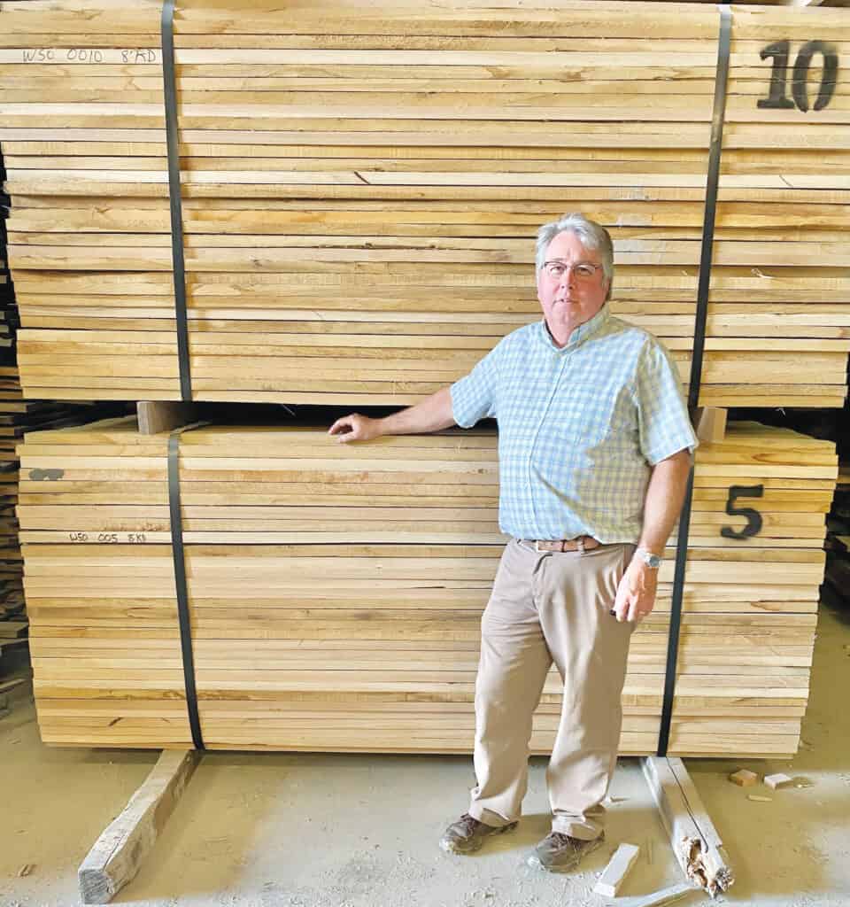 Marty Wood (owner, R&M Wood) stands in front of the company’s double end trimmed 5/4 FAS White Oak, ready for shipment. R&M buys 2.5 million board feet of lumber annually.