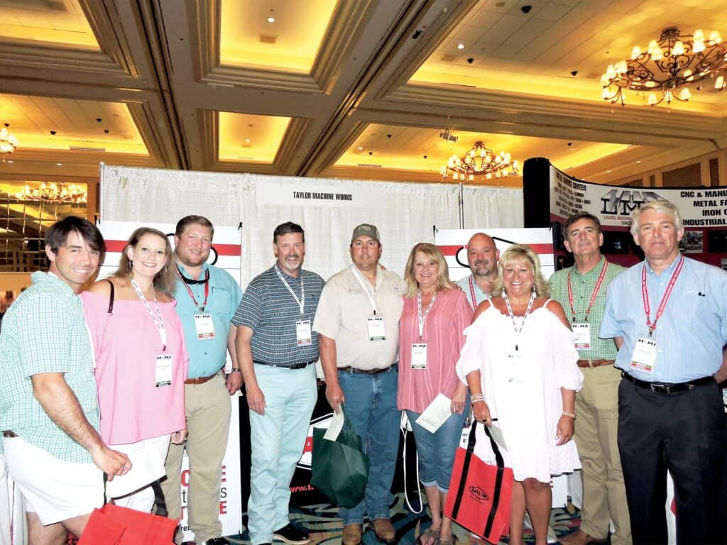 Michael Taylor, Ashley Thomas Taylor, Shuqualak Lumber Co., Shuqualak, MS; Davis Taylor and Robert Taylor, Taylor Machine Works Inc., Louisville, MS; Rick and Angie Rigdon and Melanie Thomas, Shuqualak Lumber Co.; and Hal Nowell, Barry Black and Pete Johnson, Taylor Machine Works