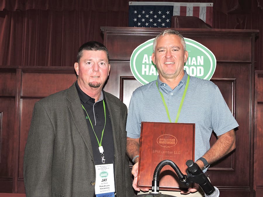 Jay Reese, AHMI president, presented a 25-year membership award to John Foley, of BPM Lumber LLC, London, KY.