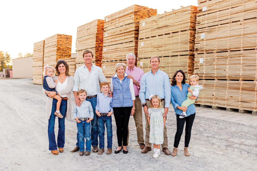 Josey Lumber and JoCo Lumber are family businesses. From left to right are Logan’s Family: Vivian, 3; Sarah; Logan; John, 5;  Charlie, 7; Debbie and Joey Josey; and Tripp’s family: Tripp, Hannah Claire, 5; Pammy; and Kitch, 2.