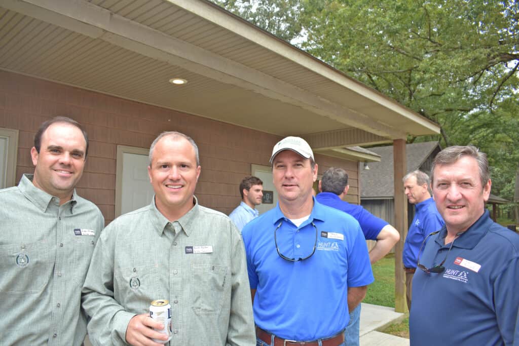 Andy Milazzo and Brett Barker, Smith Companies, Birmingham, AL; and Paul Williams and Tony Butler, Hunt Forest Products LLC, Ruston, LA