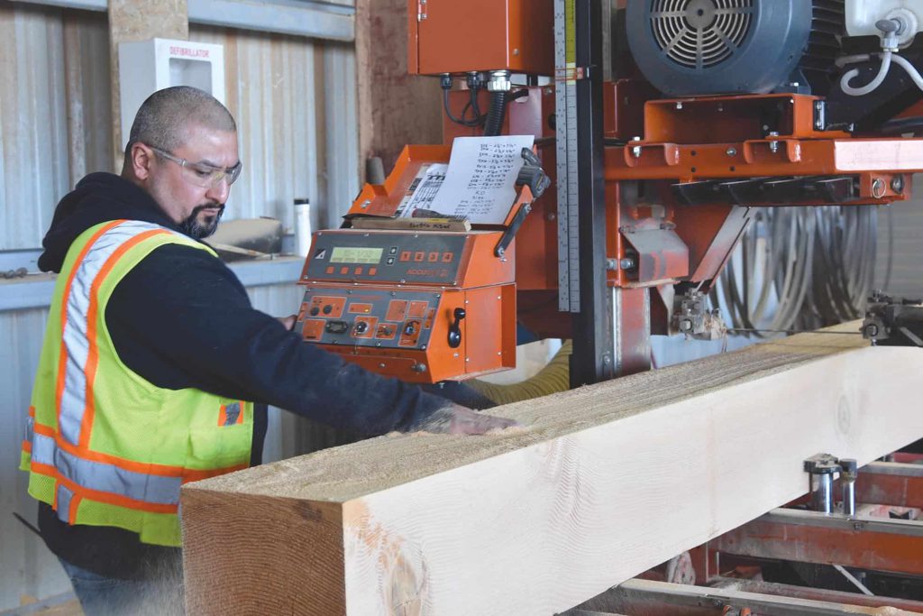 A timber is being processed at resaw at Elk Creek Forest Products.