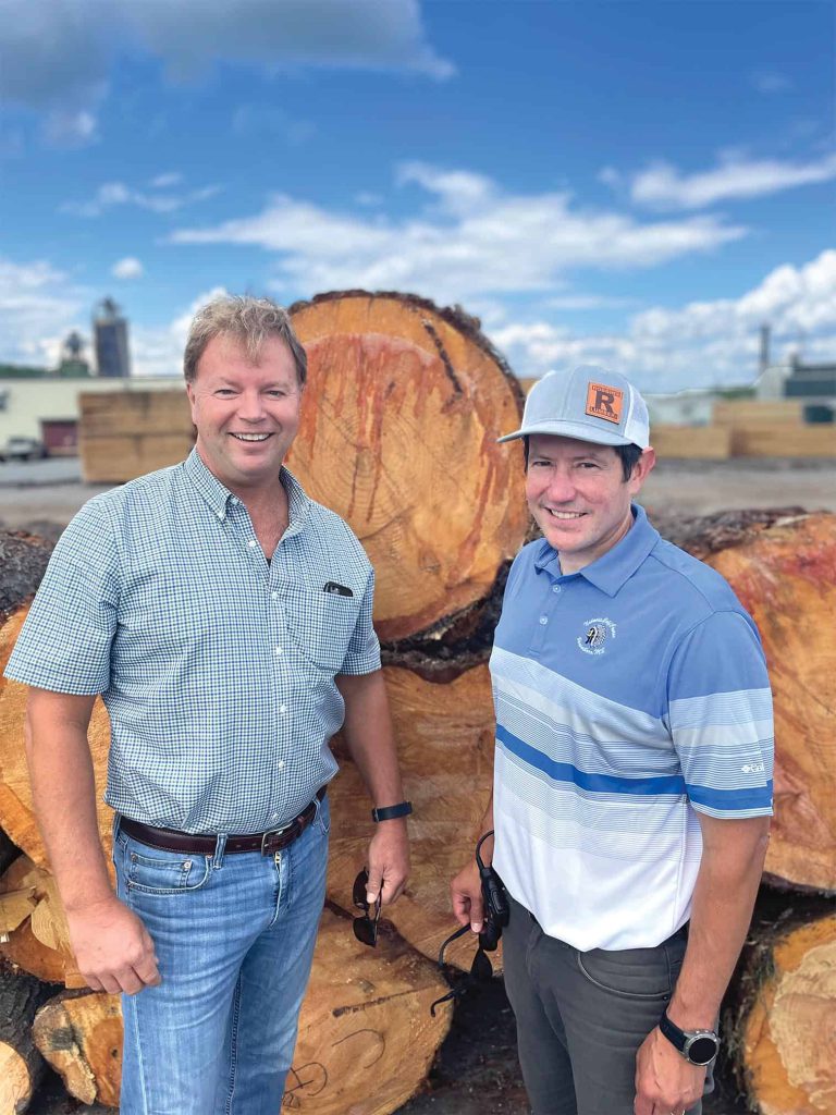 Win Smith, left, GM of Robbins East Baldwin, and Alden Robbins, Vice President of Robbins Lumber, helped bring about the merger of the two companies.