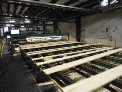 Boards go down the sawmill auto grading line.