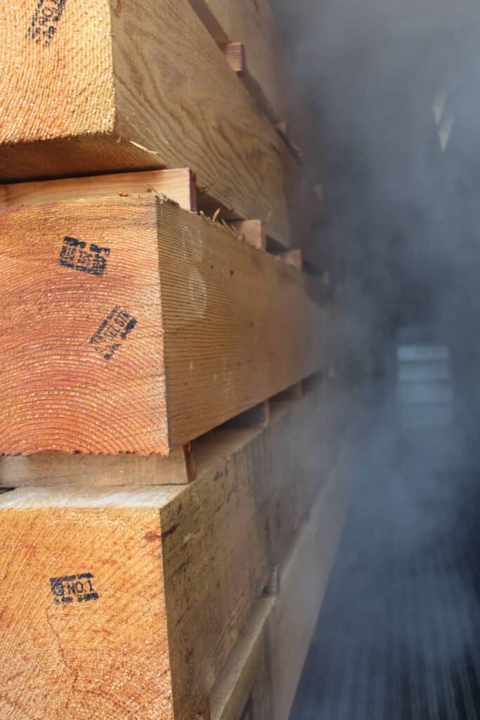 At Elk Creek Forest Products, Douglas Fir timbers receive steam conditioning.