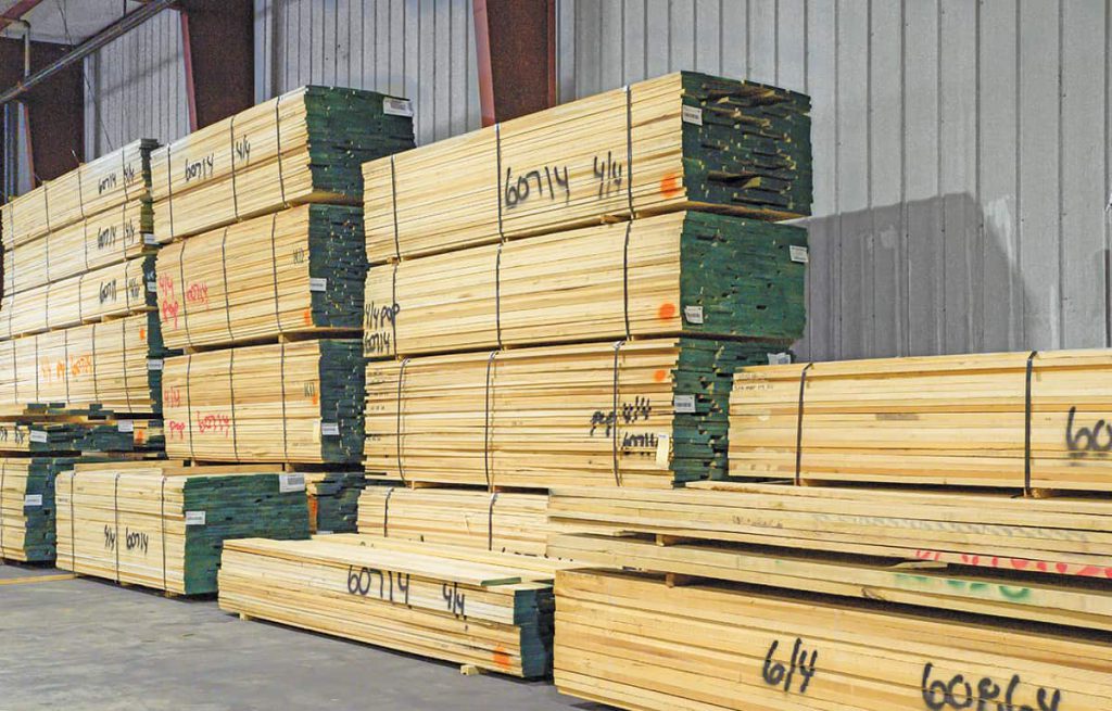 Pictured are pallets of 4/4 Poplar lumber in stock at a DIXIEPLY Florida location.