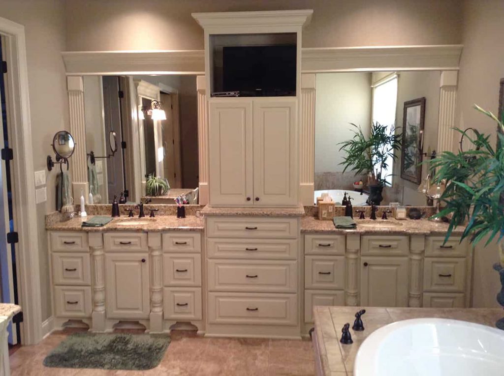 500 custom cabinet doors, like the ones shown here in a custom master bath installation, are manufactured daily at CDS.