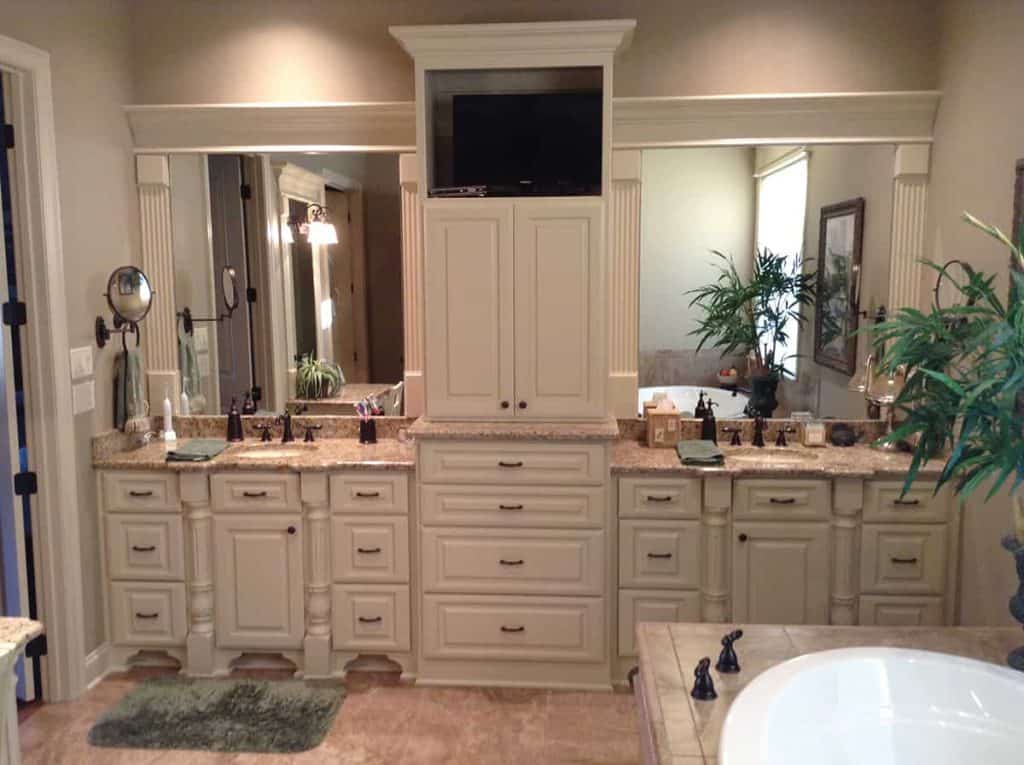 500 custom cabinet doors, like the ones shown here in a custom master bath installation, are manufactured daily at CDS.