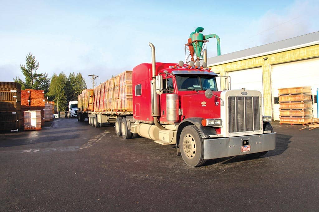 Nursery boxes from Bowers Forest Products of Beavercreek, OR are loaded on a trailer for delivery.