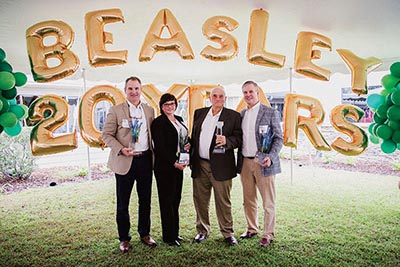 The Beasley Group is a family-run company, with leaders including: (from left) Zachary Johnson, Deborah Johnson, Rabun Beasley and Darrell Beasley.