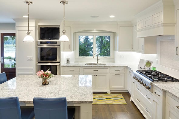 Clean lines and beautiful hardware enhance this kitchen’s gorgeous cabinets.