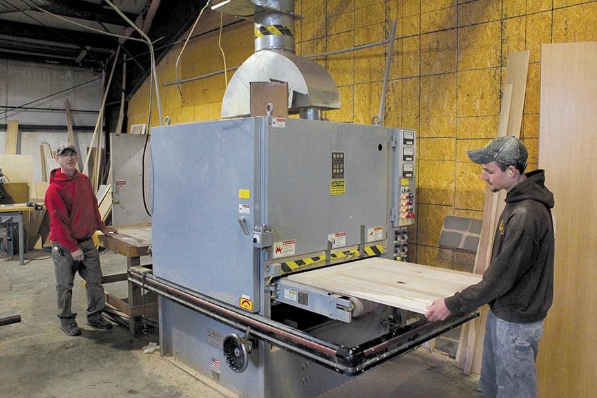 Pictured are wide panels sanded before assembly at Long’s Hardwoods.